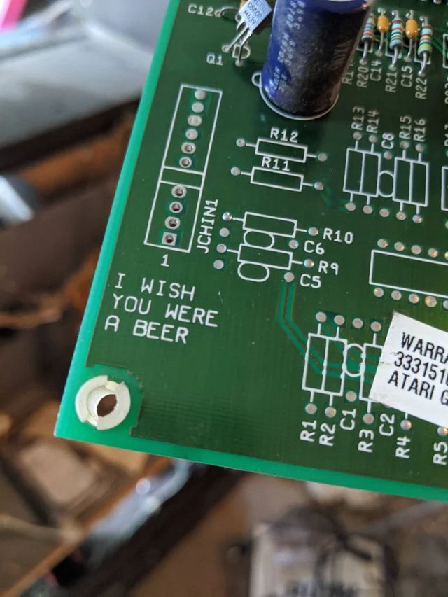 “i wish you were beer” engraved in a circuit board