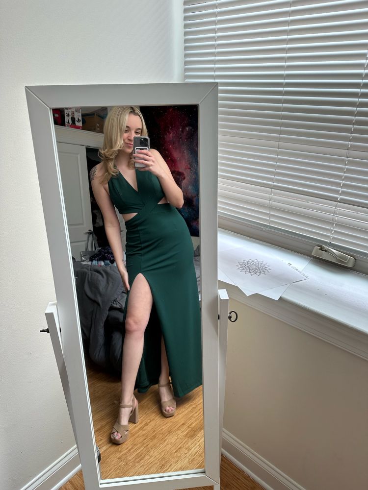 women in long green dress