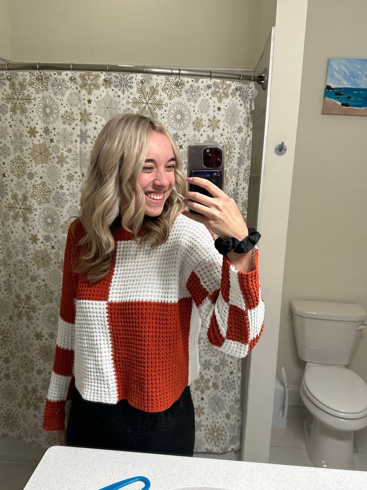 blonde balayage haircut mirror selfie 
