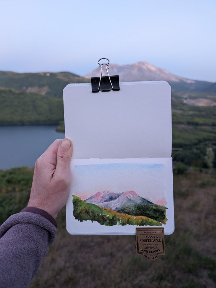 A painting of St Helens volcano at sunset from the Science and Learning Center 