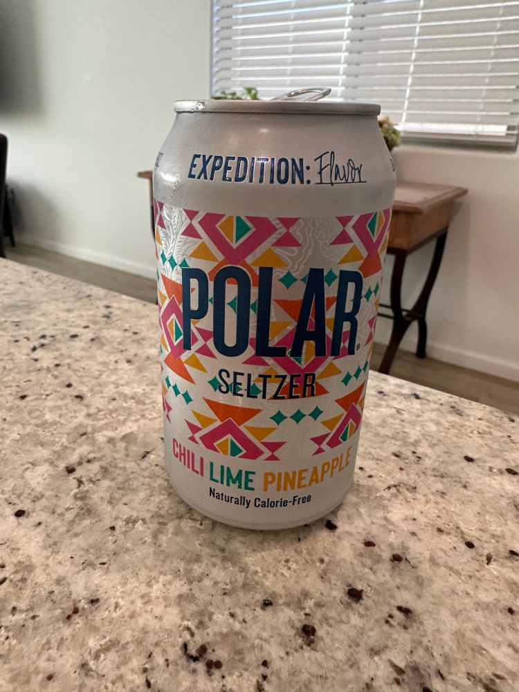 A can of chili lime pineapple seltzer. 