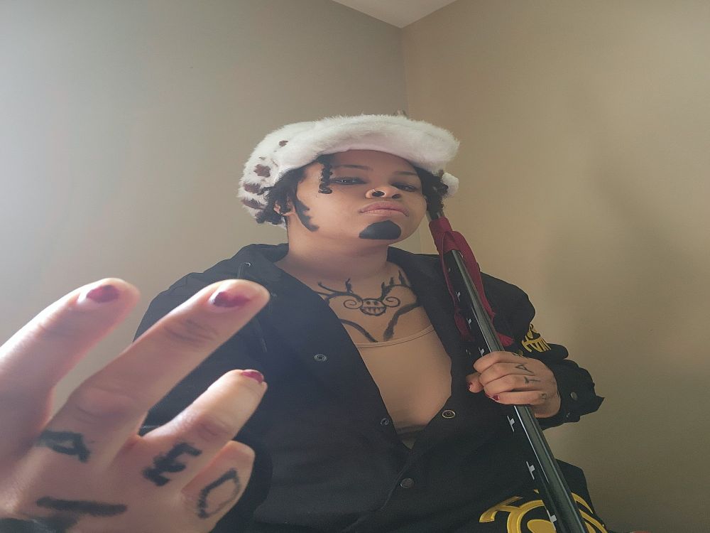 Me cosplaying as the character Trafalgar D. Water Law from the anime One Piece.