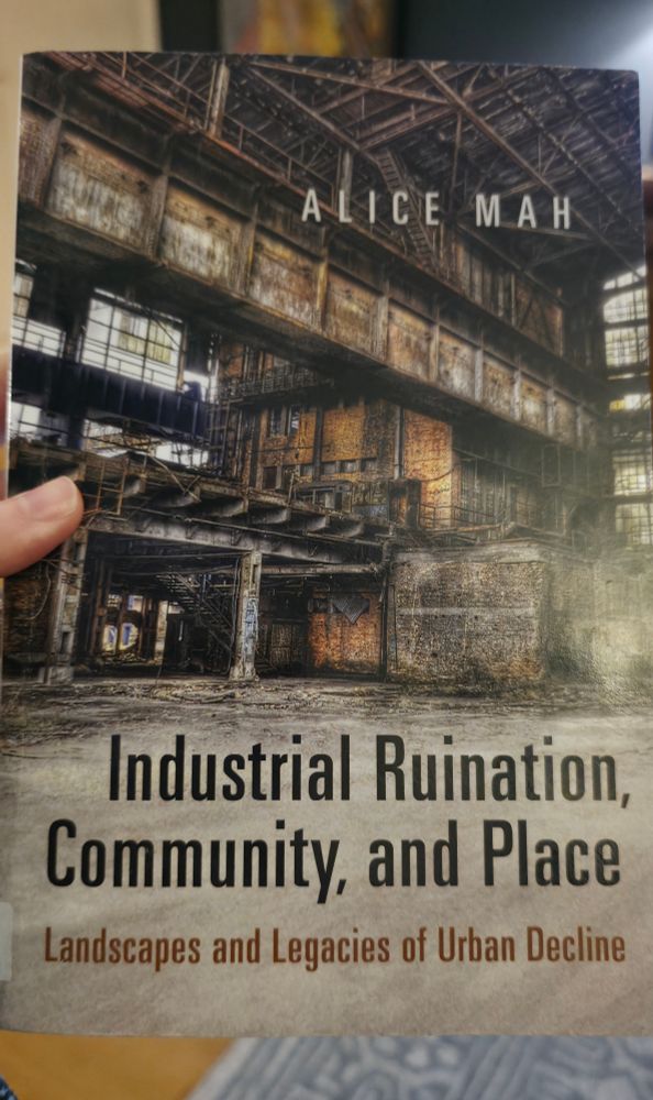 A book with a ruined factory on it and the title Industrial Ruination, Community, and Place by Alice Mah
