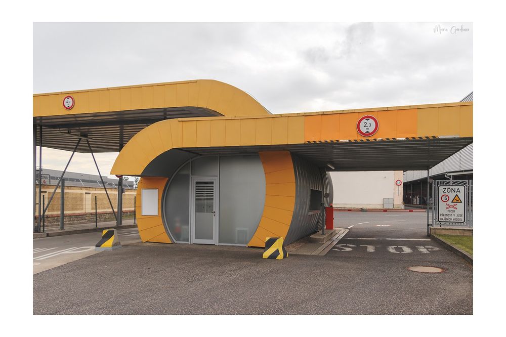 a yellow swirling frontage from a factory