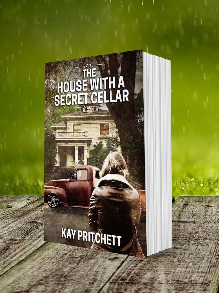 Mosey Frye, amateur sleuth, and her old truck in front of Morris House--that has a secret cellar!