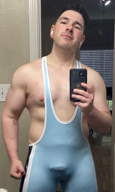 Mirror selfie of me in a singlet. 