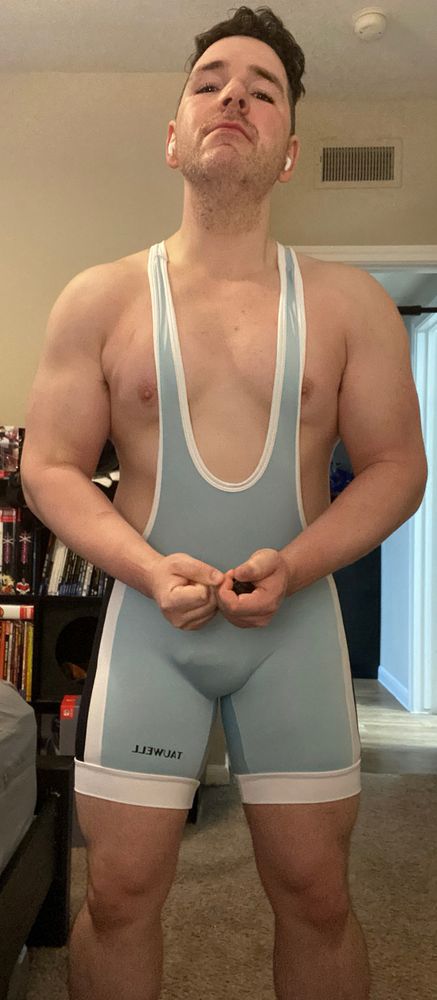 Picture of me doing a crab pose in a singlet. 