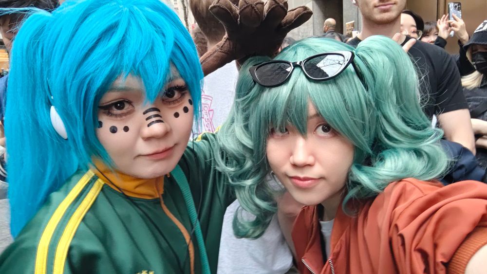 Matryoshka Miku and Sand Planet Miku cosplayers