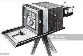 Camera created by Daguerre. An image enters thru the lens system and is projected upside-down on a glass plate at the back.