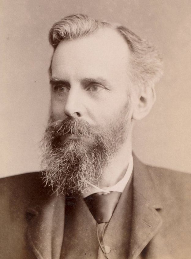 Black/white photo of John Venn with a beard, looking quite intense