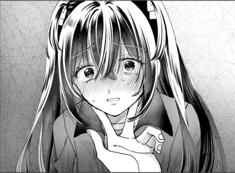 Haruyo's hands on Kasumi's chin while Kasumi looks in shock.