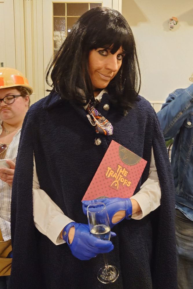 Scarily accurate Claudia-Winkleman-in-The-Traitors fancy dress costume. 