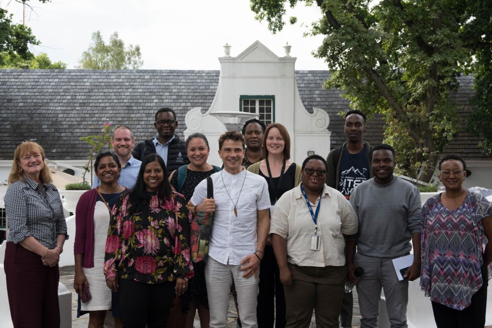 Our Platform cohort pose for a group photo