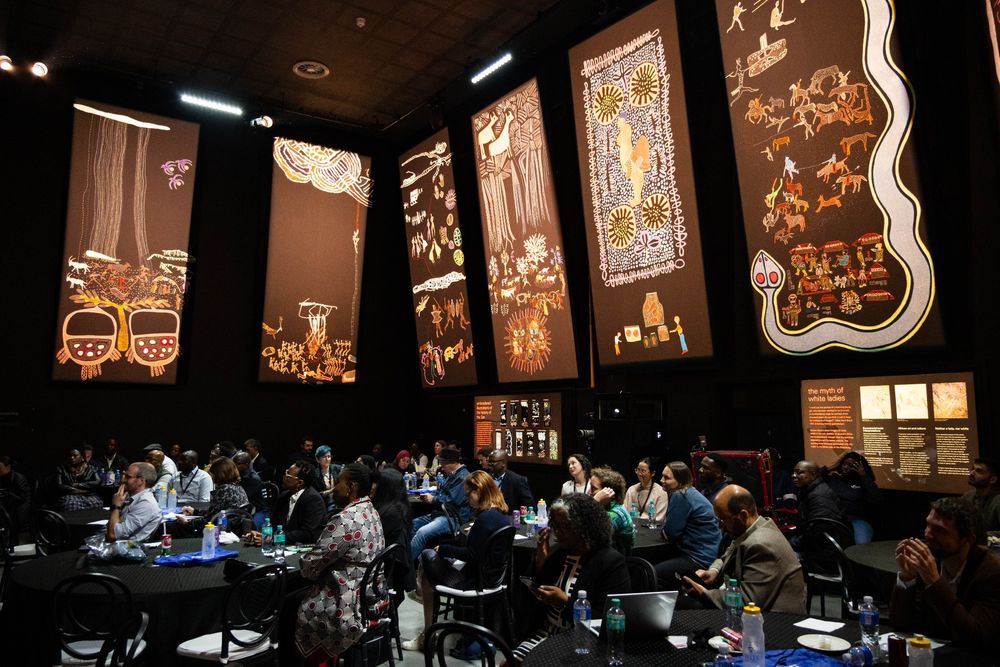 The Origins Centre Tapestry room, with our cohorts sat at their tables