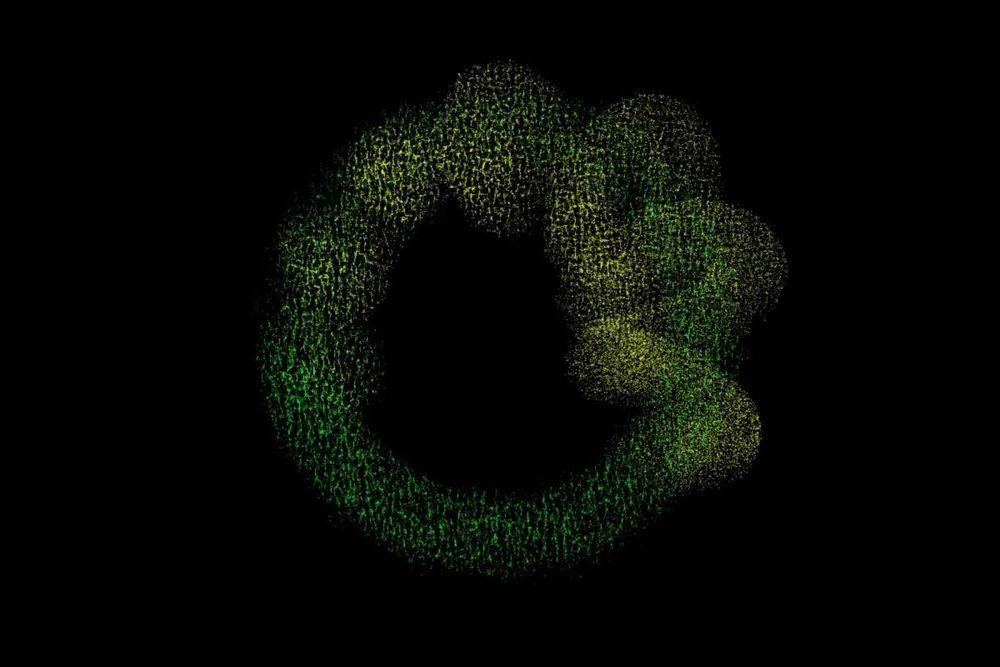 A looping line of speckled green light on a black background