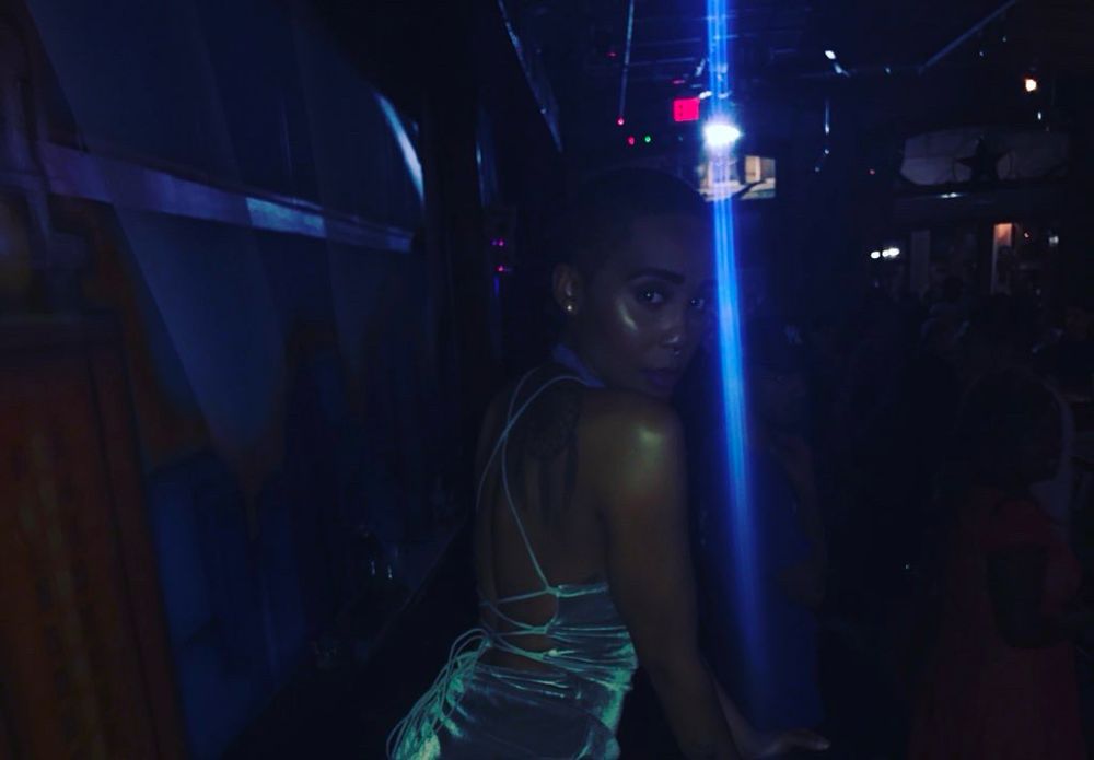 Jourdan (Skin Priestess) in a dark nightclub, circa summer 2019. 