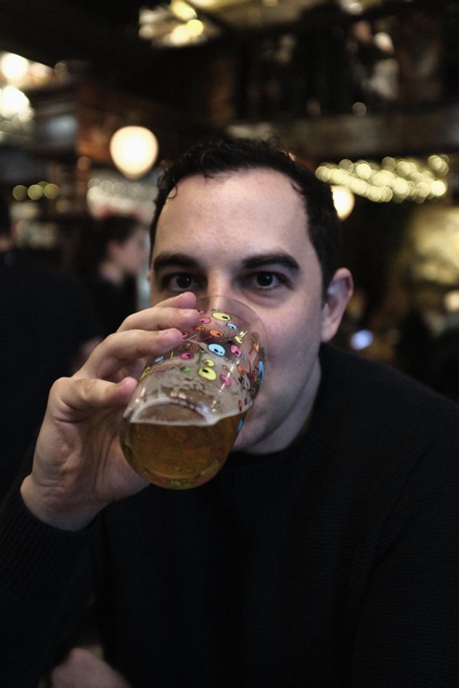 Me drinking a pint at a pub