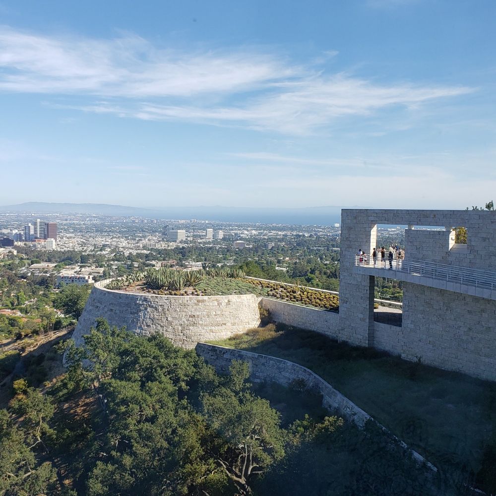 Photo of view of Los Angeles with Getty architecture and one of the gardens.