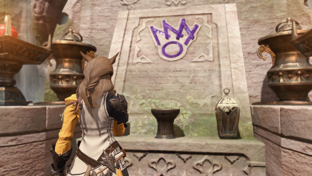 Elly praying before the Rhalgr statue