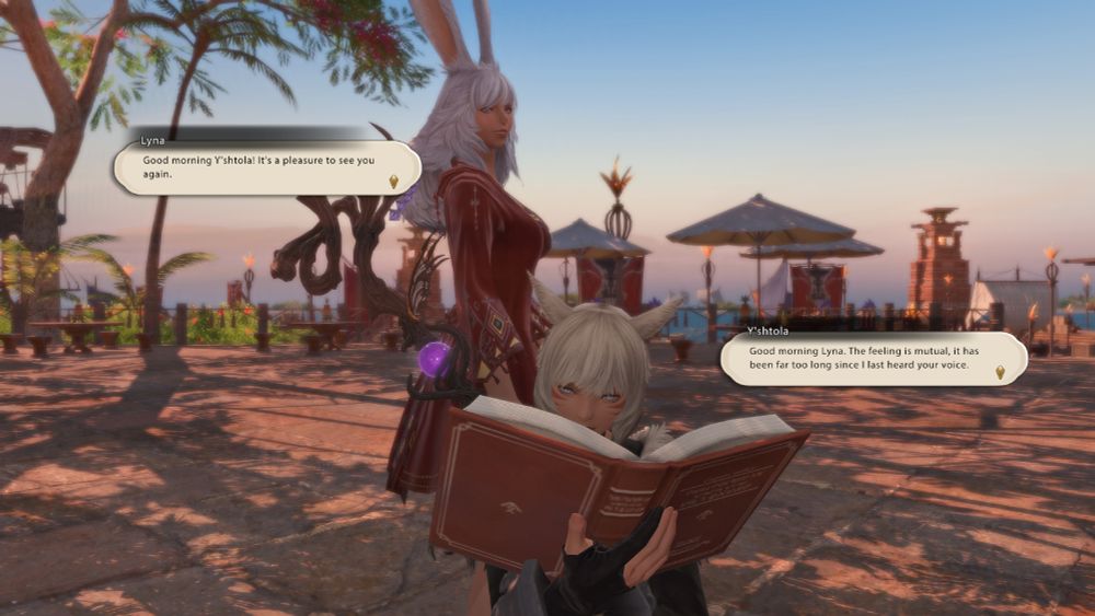 Lyna walks past Y'shtola while she's reading a book. Lyna is also in beach attire. Lyna: "Good morning Y'shtola! It's a pleasure to see you again." Y'shtola: "Good morning Lyna. The feeling is mutual, it has been far too long since I last heard your voice."