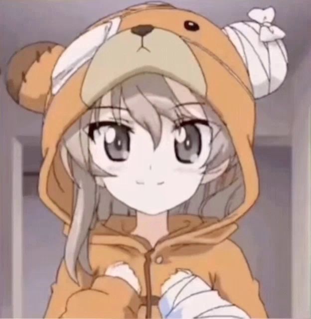 a girl in a teddy bear costume with a bandage on her head