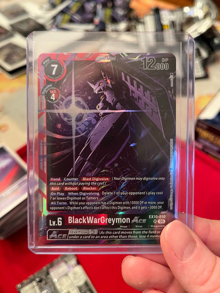 BlackWarGreymon Digimon card. 