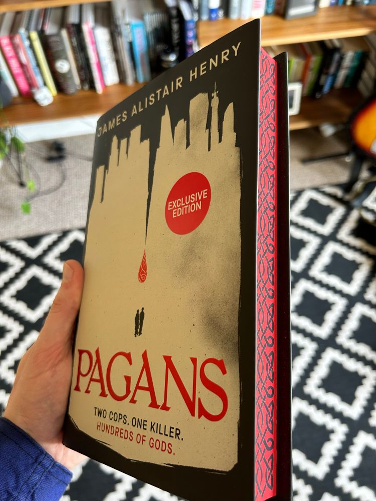 A lovely hardback copy of James Alister Henry’s debut novel Pagans. It’s has special ornate sprayed red and black edges. It will likely be mistaken for an ancient artefact full of mysteries. 