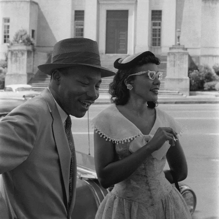 Martin Luther King, Jr. smiling with his wife