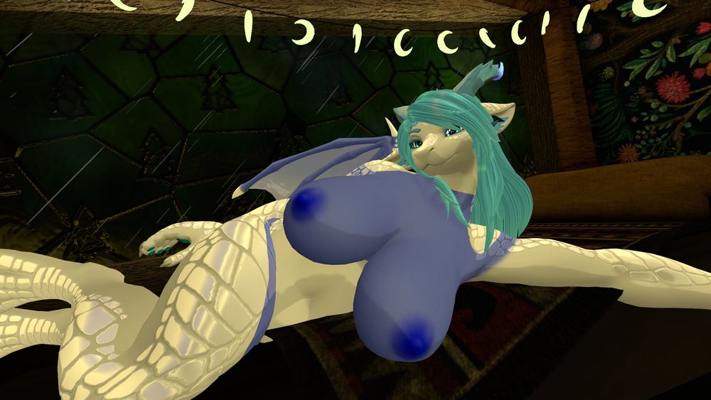 A blue and white dragon sprawled out showing off their whole body 