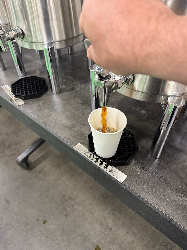 Pouring a cup of tech conference coffee. Sure to please…