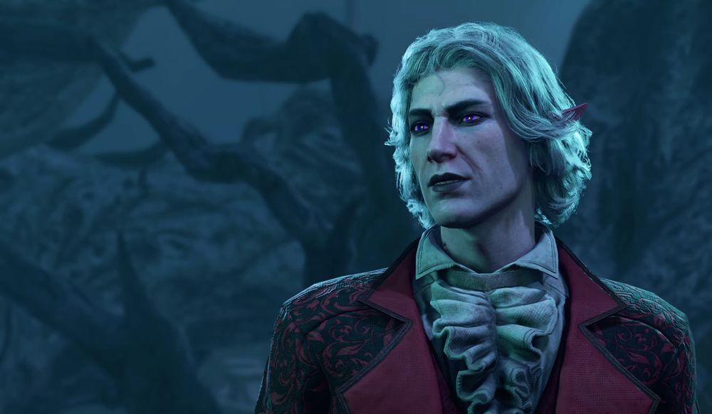 A screenshot taken from Balder's Gate 3 of Astarion with a mod installed which makes him look a little different than usual.  He has longer, silver hair, violet eyes, dark lips, eye shadow and is wearing a dapper burgundy coat with a ruffled cravat.  