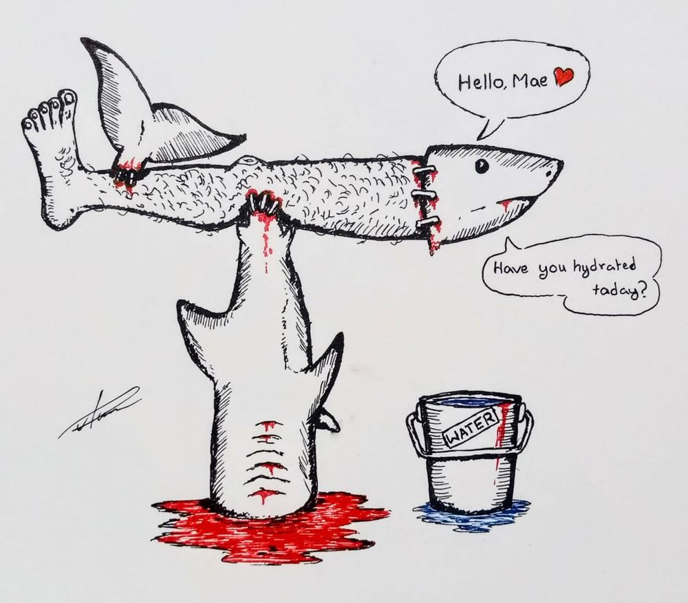 A hairy leg with a decapitated shark stapled to it, with the head in turn stapled on the thigh. Quite an amazing sight, isn't it?