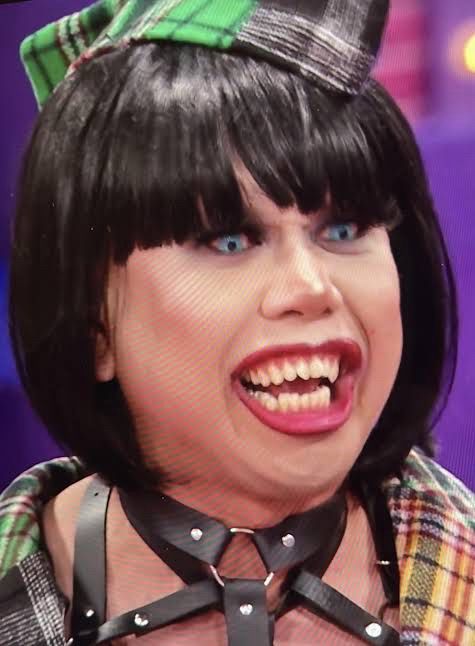 Melinda Verga looking angry with a black bob