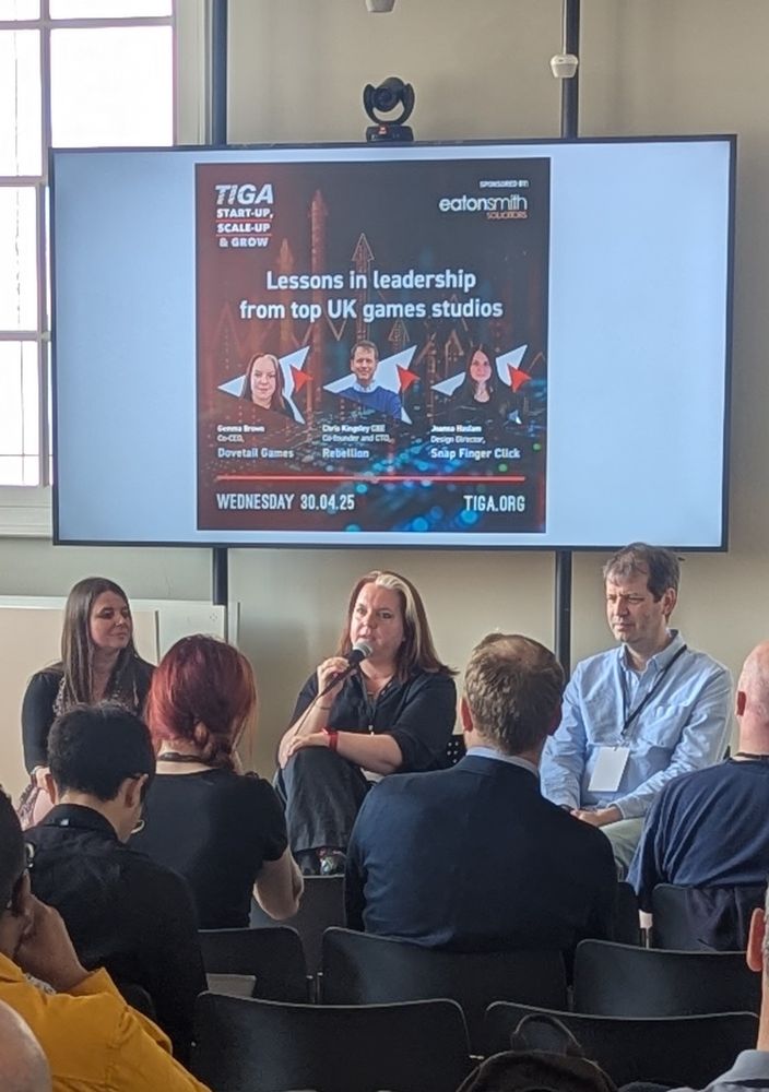 Photo of panel discussion on leadership in videogames