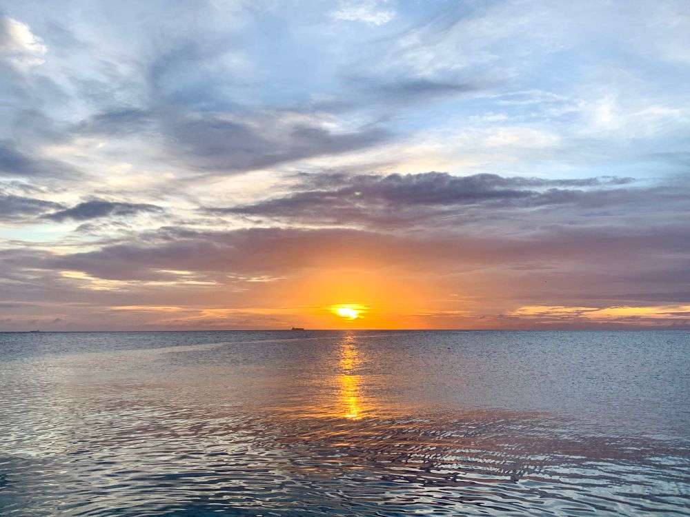 First sunset of 2025 over the Caribbean Sea 