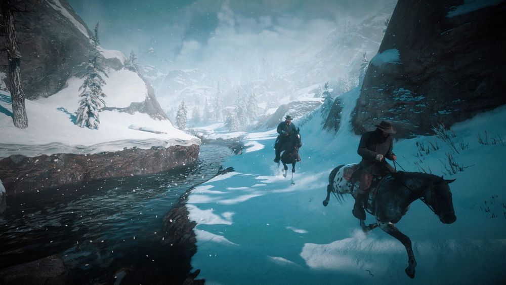 Charles (front) and Arthur (back) riding through snow, next to a stream. There are trees and snow-capped mountains in the background. They are on a hunting trip together, where Charles will teach Arthur how to track animals & use a bow and arrows. 