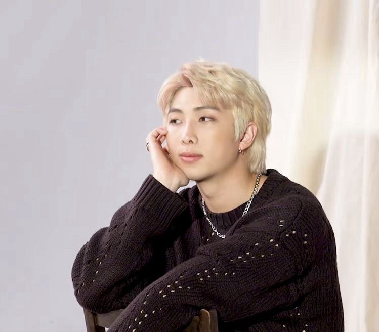 Kim Namjoon as blonde, staring wistfully