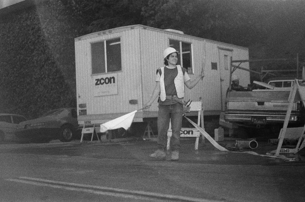 Ellen directing traffic in front of a construction site in 1988.