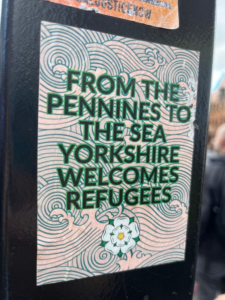 Sticker saying ‘From the Pennines to the sea Yorkshire welcomes refugees’