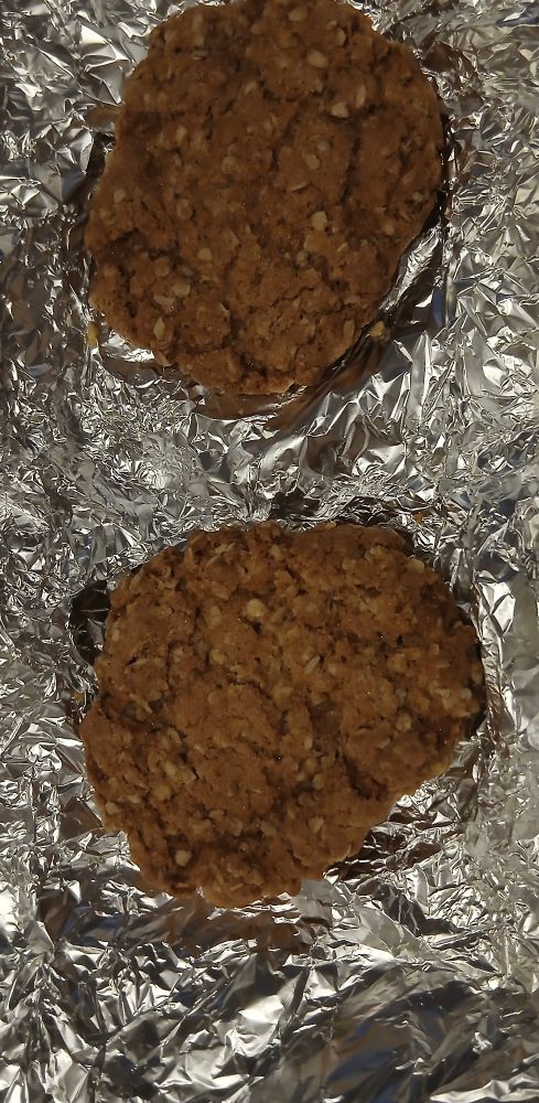 Oat biscuits against foil.