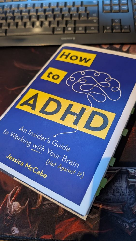 A photographie of the book "How to ADHD" of Jessica McCabe.