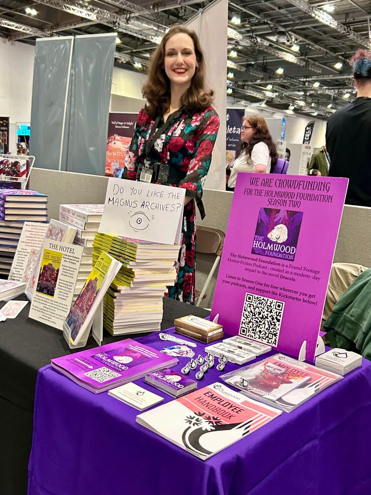 A picture of Georgia at our stall highlighting our Holmwood Foundation goodies and Georgia’s self published books