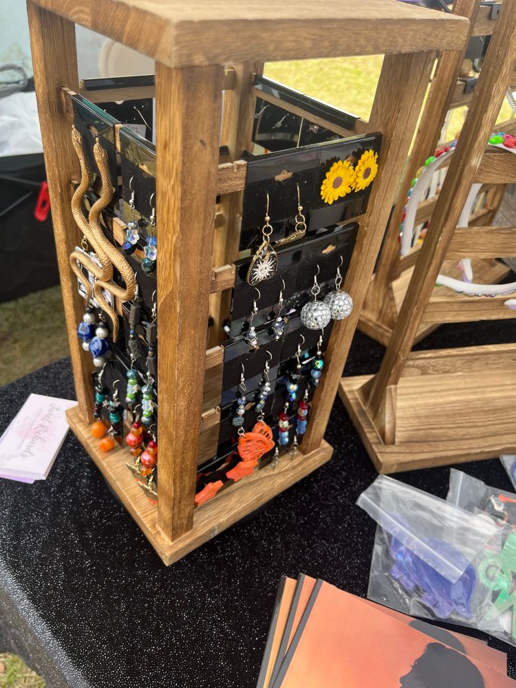 A picture of the rotating earring display which holds 48 pairs of earrings. 