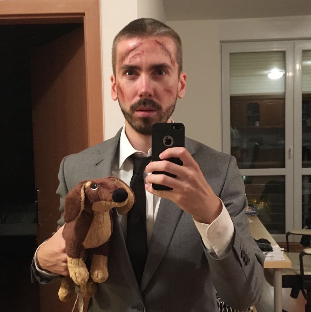 John Wick cosplay with ikea plushie dog toy