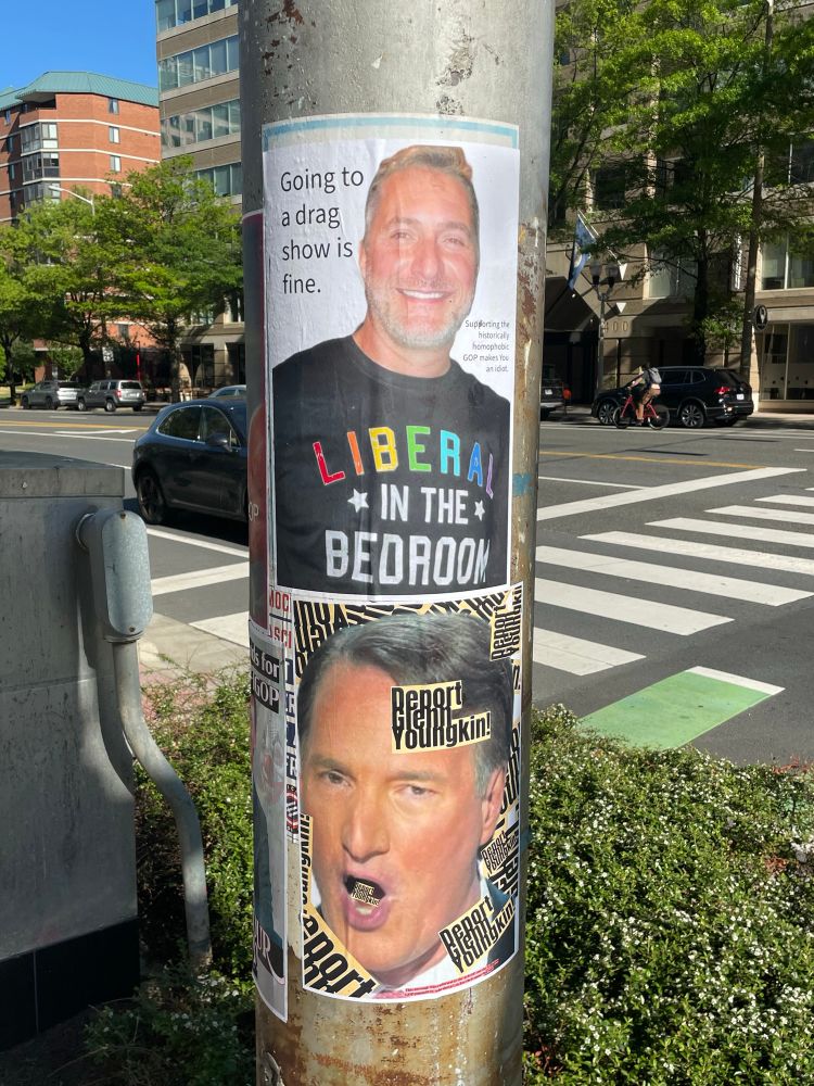 Meme of John Reid in a rainbow shirt saying “liberal in the bedroom” captioned “going to a drag show is fine, supporting the historically homophobic GOP makes you an idiot”