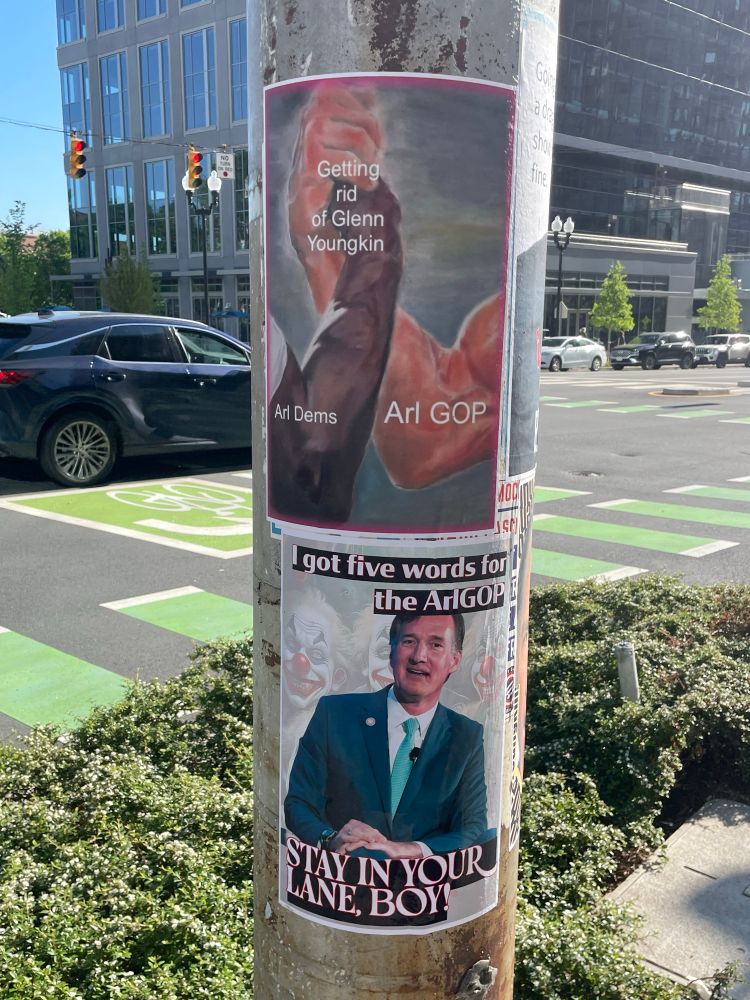A wheat paste of Glenn youngkin stating “I’ve got five words of the ArlGOP, stay in your lane, boy”