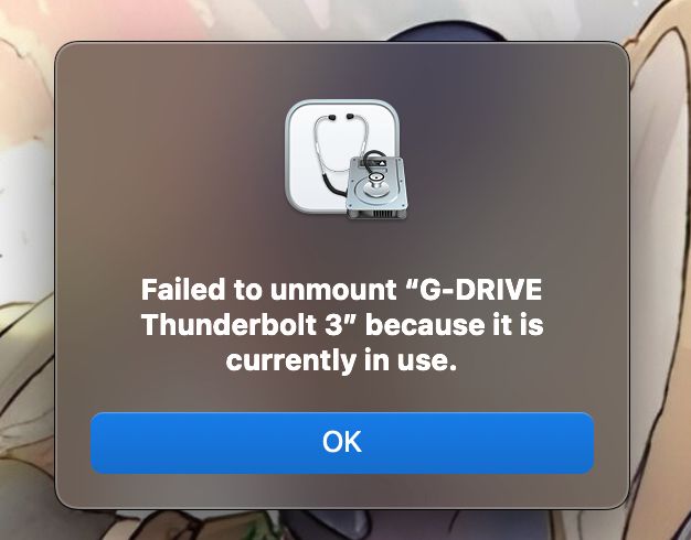 macOS Disk Utility popup that reads "Failed to unmount "G-DRIVE Thunderbolt 3" because it is currently in use."