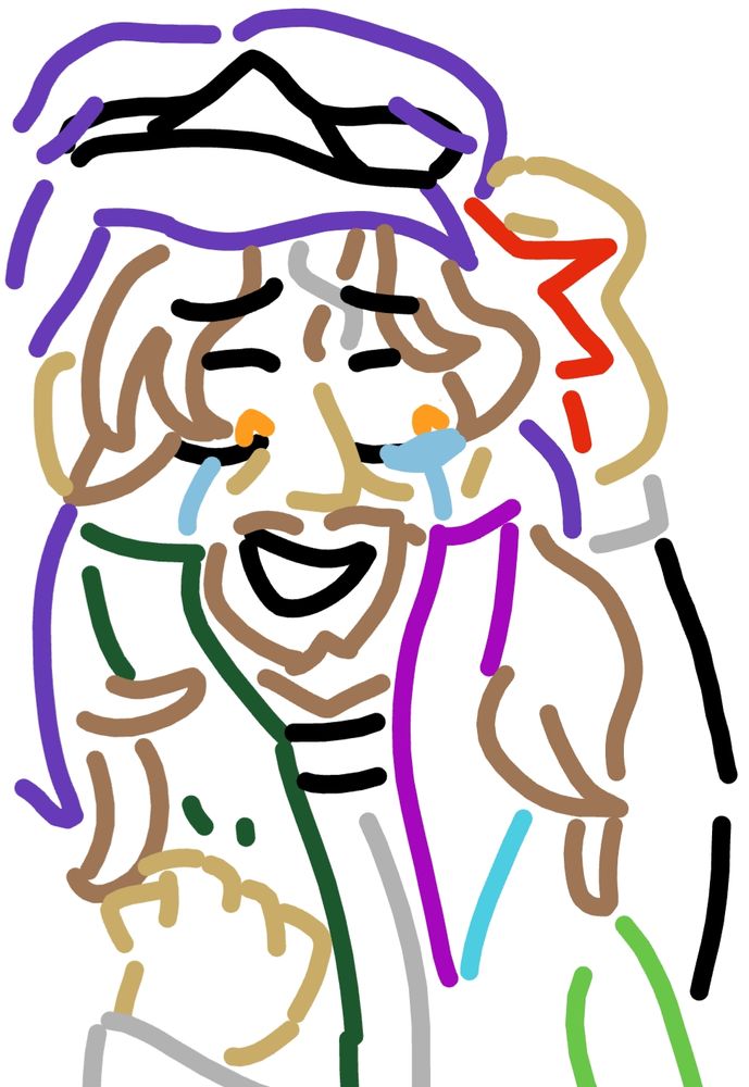 A man crying, whilst also smiling at the same time