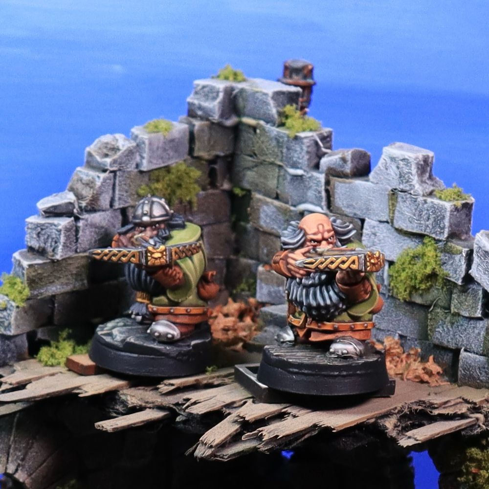 Closeup of two henchmen dwarves with crossbows and green jerkins.