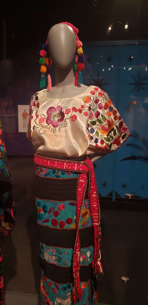 a photo of a woman's regional mexican fashion
